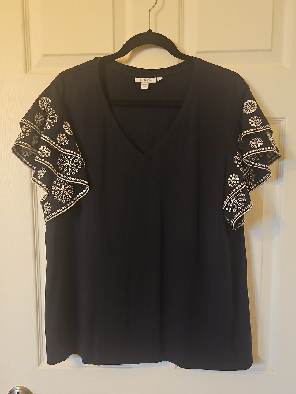 Women's Navy V-Neck Top with Embroidered Flutter Sleeves